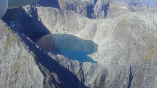 A hidden lake above Milford Sound, ready to overflow at the first sign of rain.